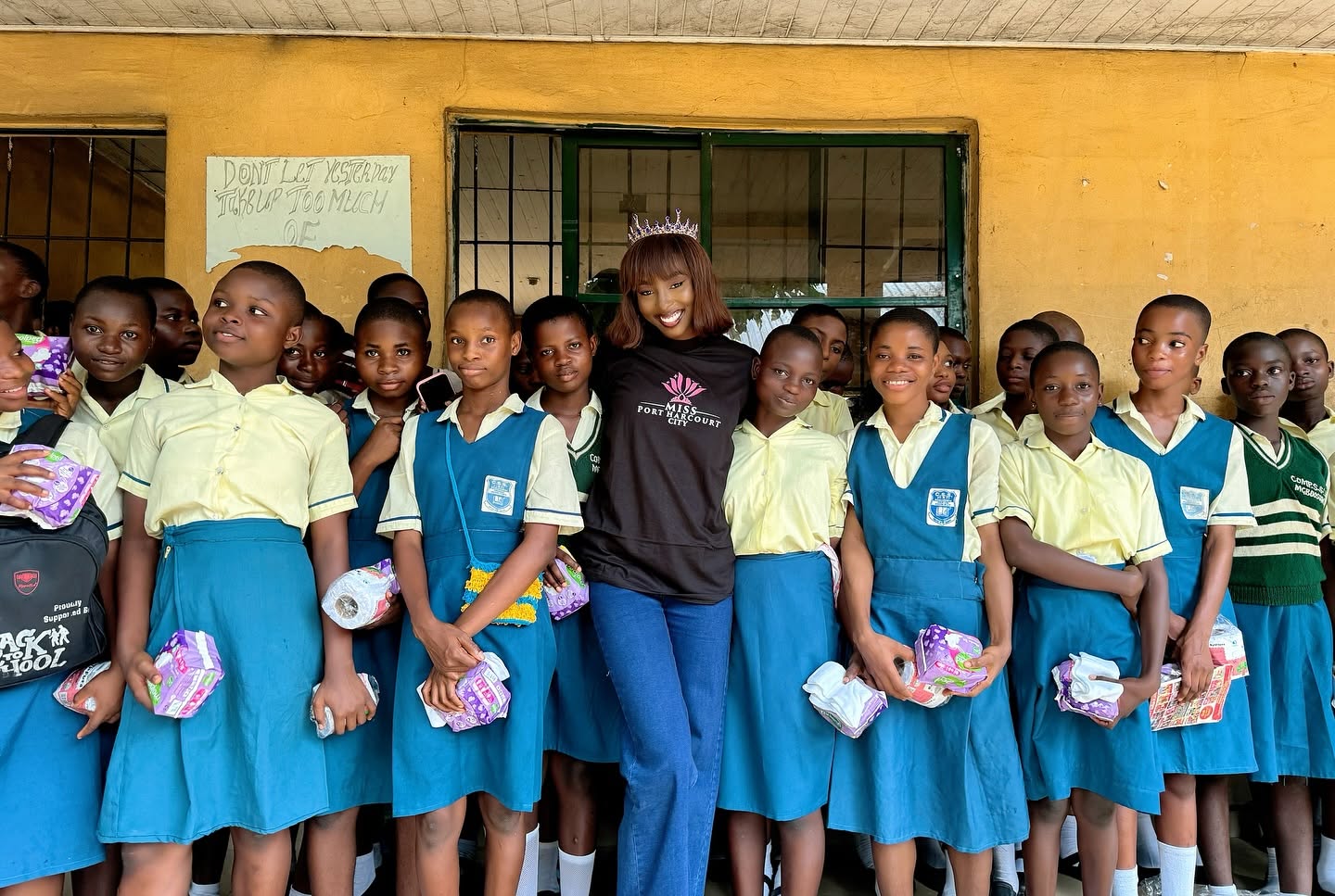 Queen Soye with school children from the Beyond Label Initiative community